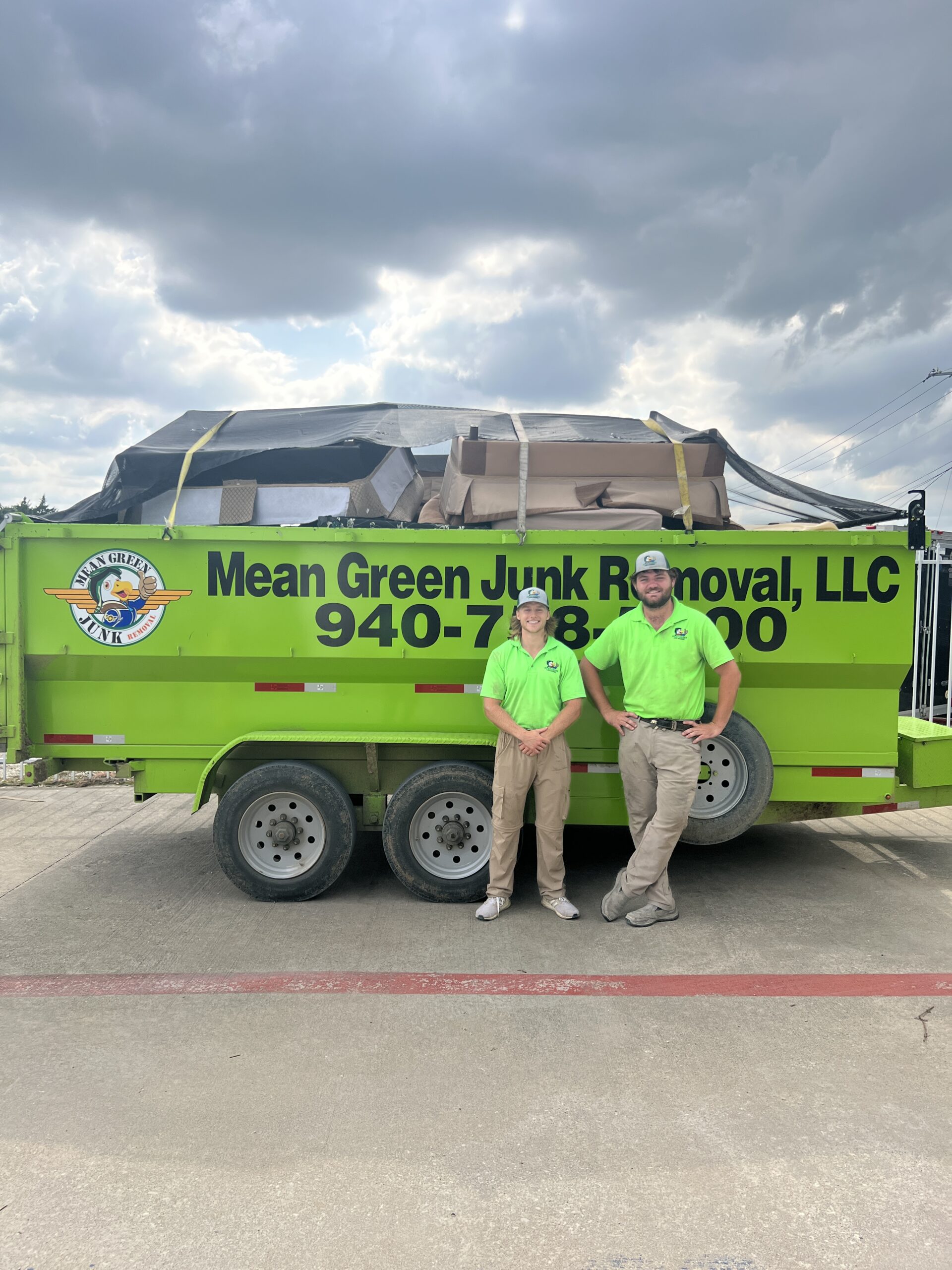 mean green junk removal truck and crew