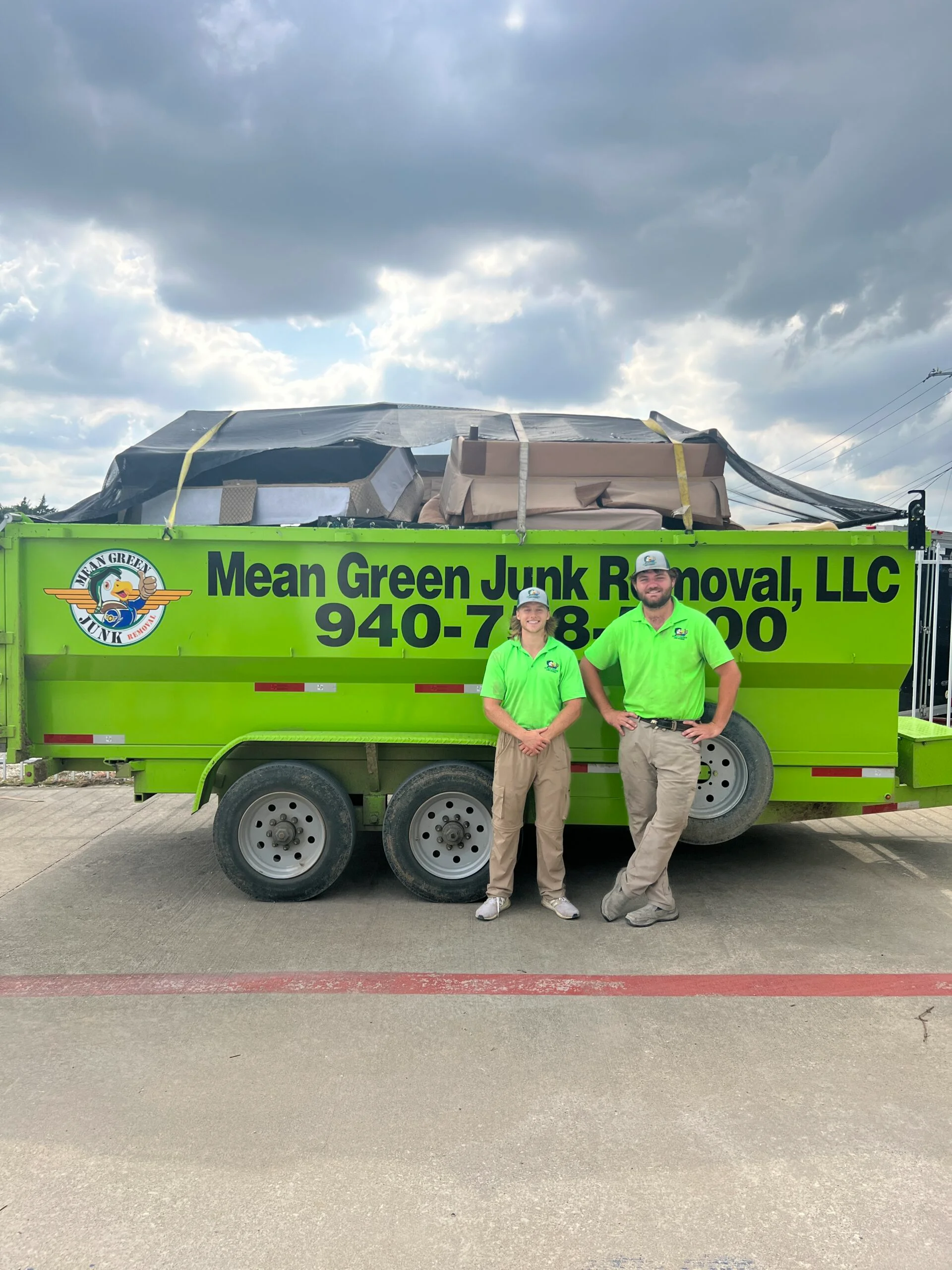 mean-green-junk-removal-truck-and-crew